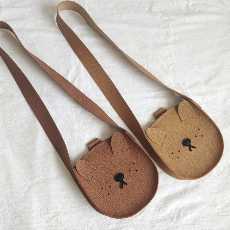 Korean version versatile fashion simple Pu children's dog messenger bag children's shoulder bag zero wallet mobile phone bag