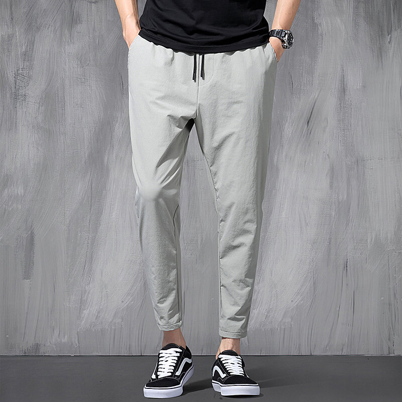 2024 New Korean Ice Silk Elastic Trousers Four Seasons Thin Casual Men'S Loose 9-Point Large Size Small Foot Sports Pants Spring