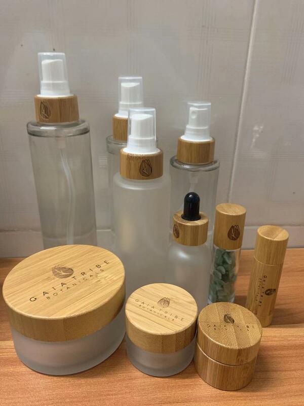 Cosmetic 30ml 50ml flat shoulder frosted cream jar with bamboo lotion pump lid Glass Perfume Wooden Bamboo Cap Sprayer Bottle