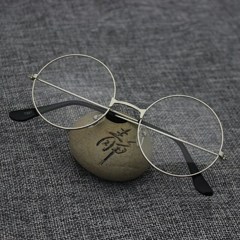 Круглые очки с прозрачными линзами в металлической оправе