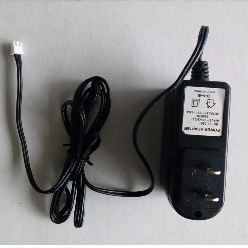 Cet adaptateur d'alimentation s'applique à la sonnette d'interphone visuel, sortie DCV13.5V