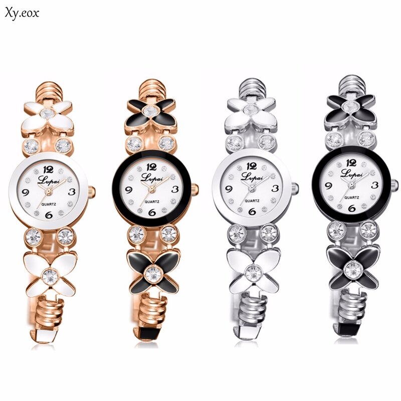 女性の 4 葉のクローバーの花ブリンブリンラインストーン腕時計クォーツ時計