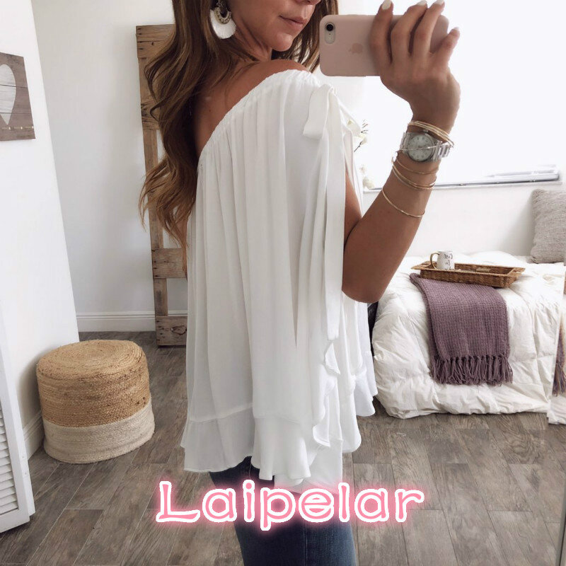 Camisa blanca Sexy para mujer, Top de un hombro con cuello oblicuo, blusa informal holgada de gasa con tirantes finos, 2019