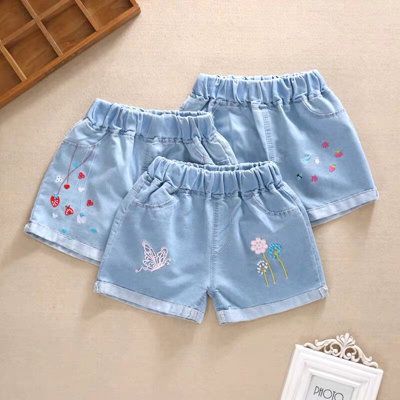 Pantalones cortos de mezclilla para niñas pequeñas, sección delgada grande, ropa de moda para niños, pantalones calientes con agujeros