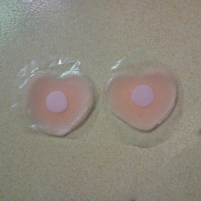 Las mujeres reutilizable cubierta de pezón Auto adhesivo empanadas de mama de silicona etiqueta encanto Bra Pad cubre pezones Sexy