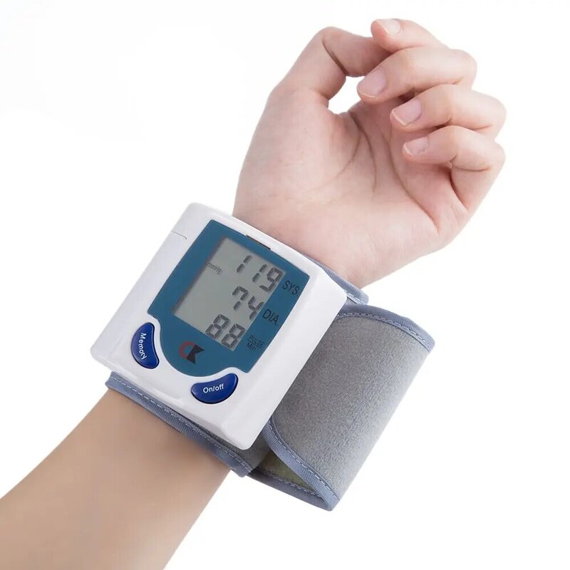 Hogar médico presión arterial de muñeca Monitor LCD Digital tonómetro automático esfigmomanómetro tensiómetro Bp de Metro