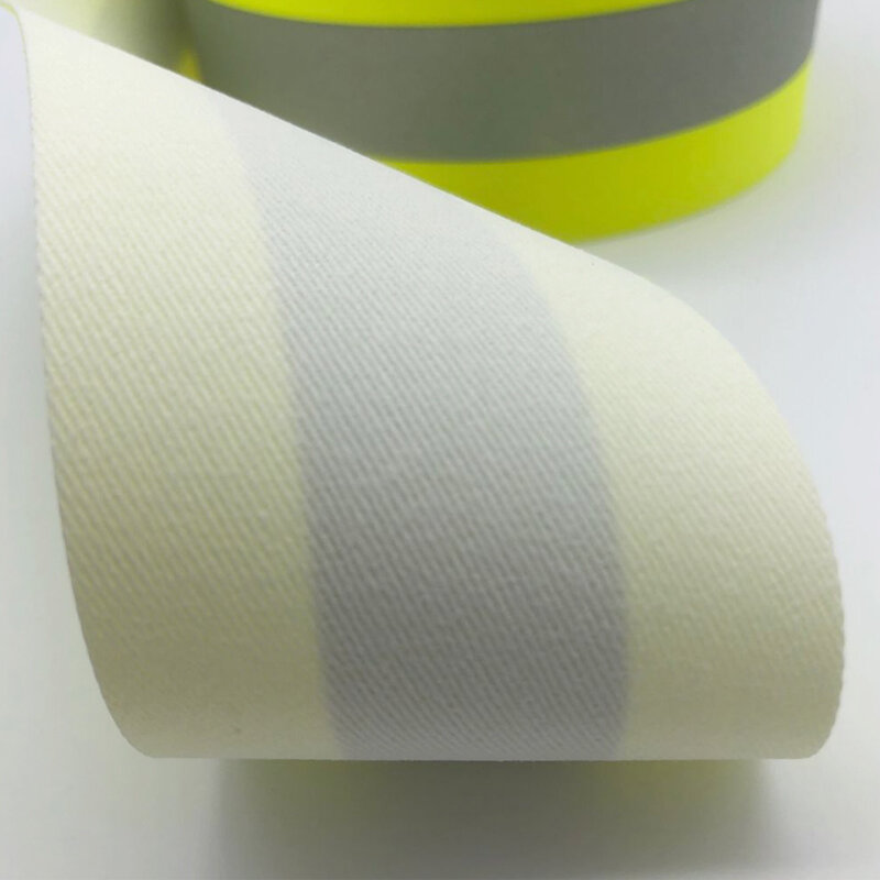 Materiale riflettente ignifugo in tessuto con supporto in cotone 100% cucito su abbigliamento