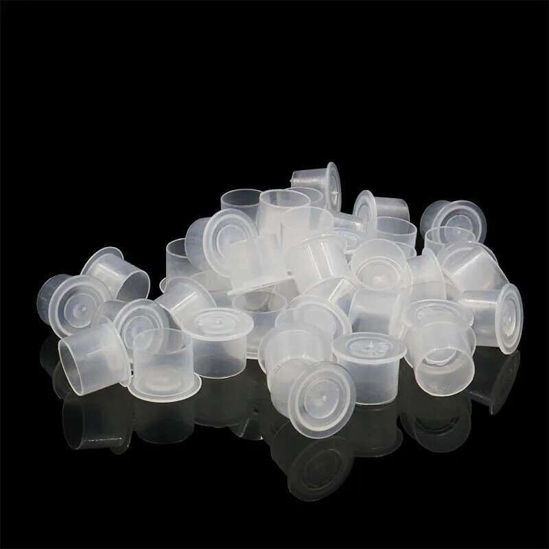 100個使い捨てmicroblading着実なプラスチック製インクカップ4サイズアートメイク顔料クリアホルダー容器キャップ