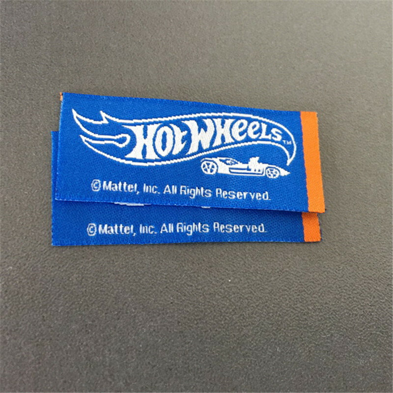 Customized double density woven flag label