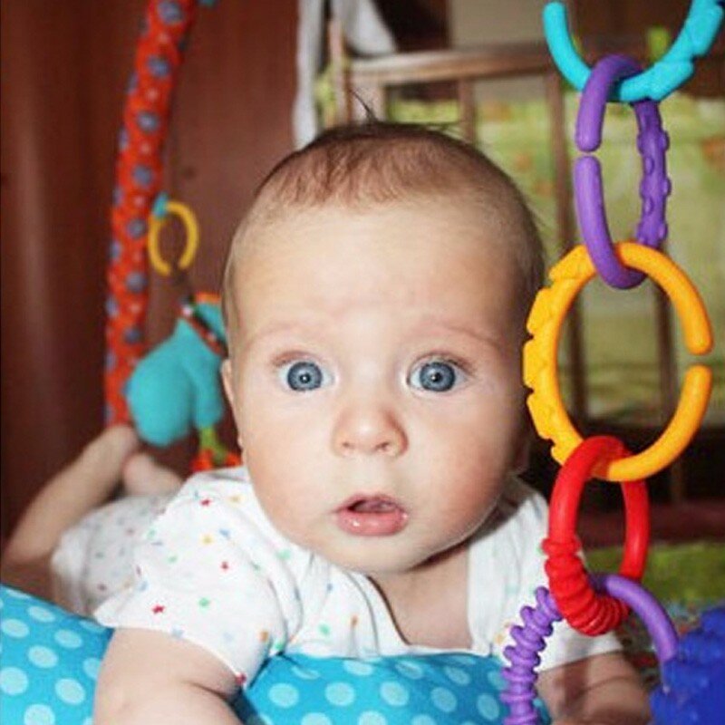 24ピース/ロットベビーおしゃぶりおもちゃカラフルな虹リング赤ちゃんのガラガラベビーベッドベビーカー装飾知育玩具