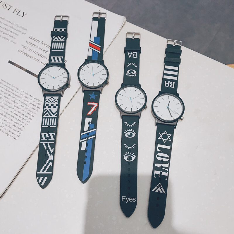 Par de relojes un par de versiones coreanas de la tendencia de estudiantes simple hombres y mujeres en la mesa con reloj de cuarzo a la moda m