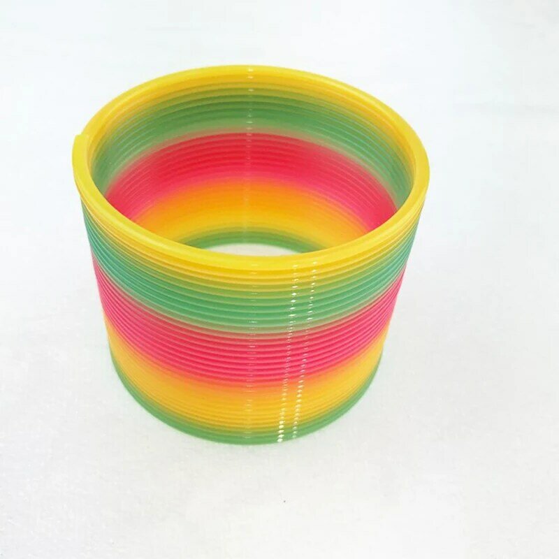 Juguete de plástico con espiral de arcoíris para niños, rellenos de Piñata, premios, favores de fiesta, 7,5 CM