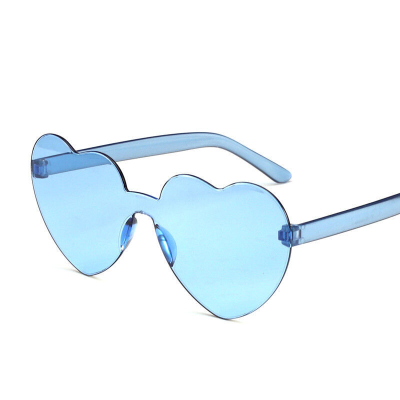 Spedizione gratuita 2023 occhiali da sole con personalità dell'oceano a forma di cuore color caramella