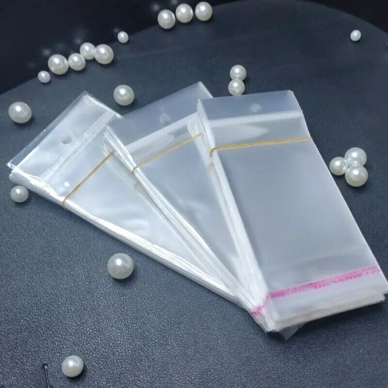 50/100Pcs Transparan Penyegelan Diri Perekat Kantong OPP Tas Penyimpanan Plastik Tas dengan Menggantung Lubang untuk Perhiasan Tampilan Ritel Paket