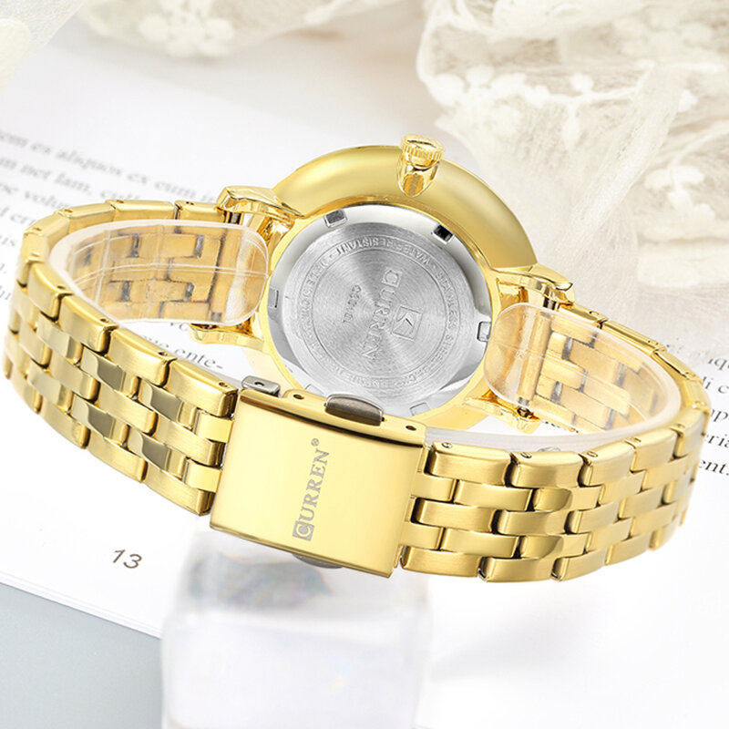 Curren Gold Edelstahl Uhr Frauen Luxus Marke frauen Quarz Uhren Wasserdicht Bling Kristall Damen Uhren Montre Femme