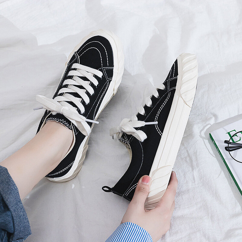 Primavera designer nova tendência coreana baixa ajuda redonda plana mulher preto sapatos de lona net estrela vermelha com o mesmo simples tênis caminhada