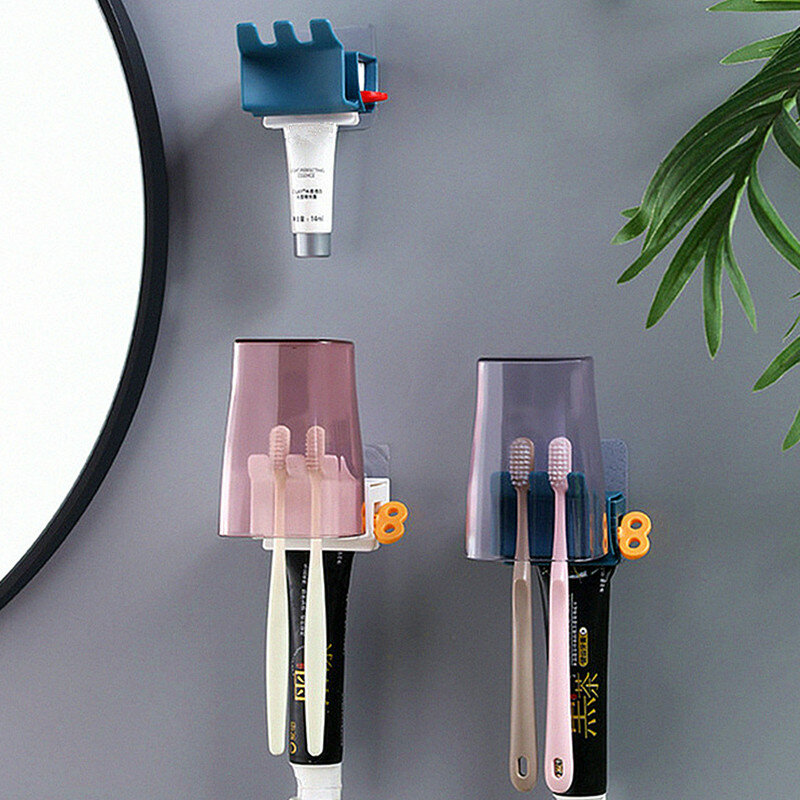 Vendita calda dentifricio in plastica spremiagrumi portaspazzolino Dispenser facile rotolamento forniture per il bagno accessori per la pulizia dei denti