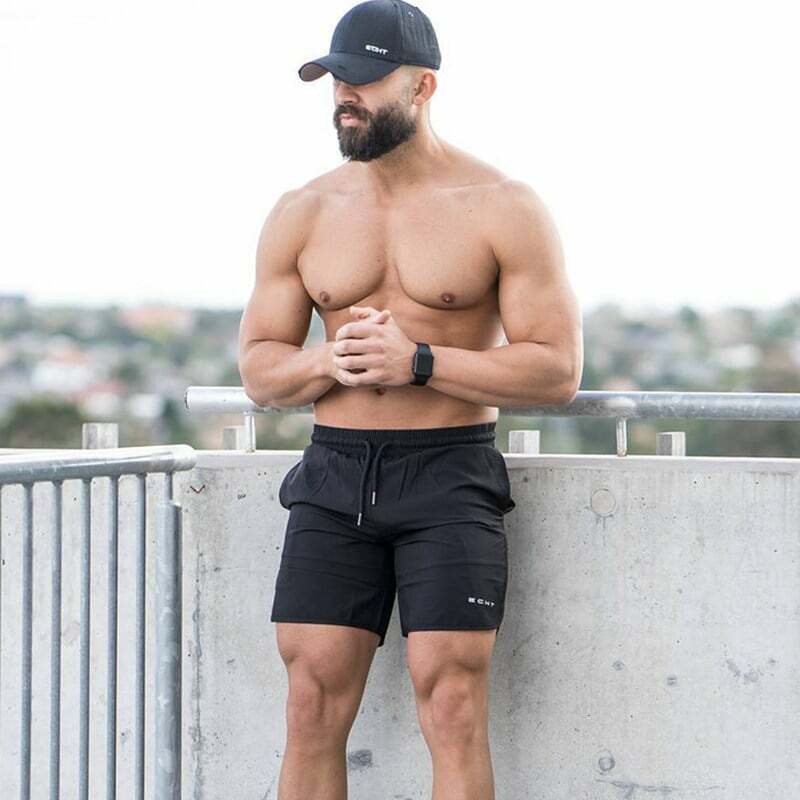 Celana pendek longgar kebugaran Gym pria, bawahan Jogger binaraga musim panas cepat kering keren kasual pantai 2023 untuk lelaki