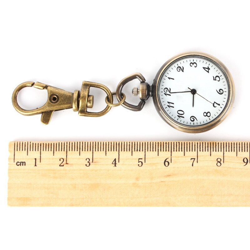 LLavero de bolsillo con pendiente de reloj de cuarzo redondo para mujer y niño, accesorio de Color bronce, reloj para regalo de Navidad