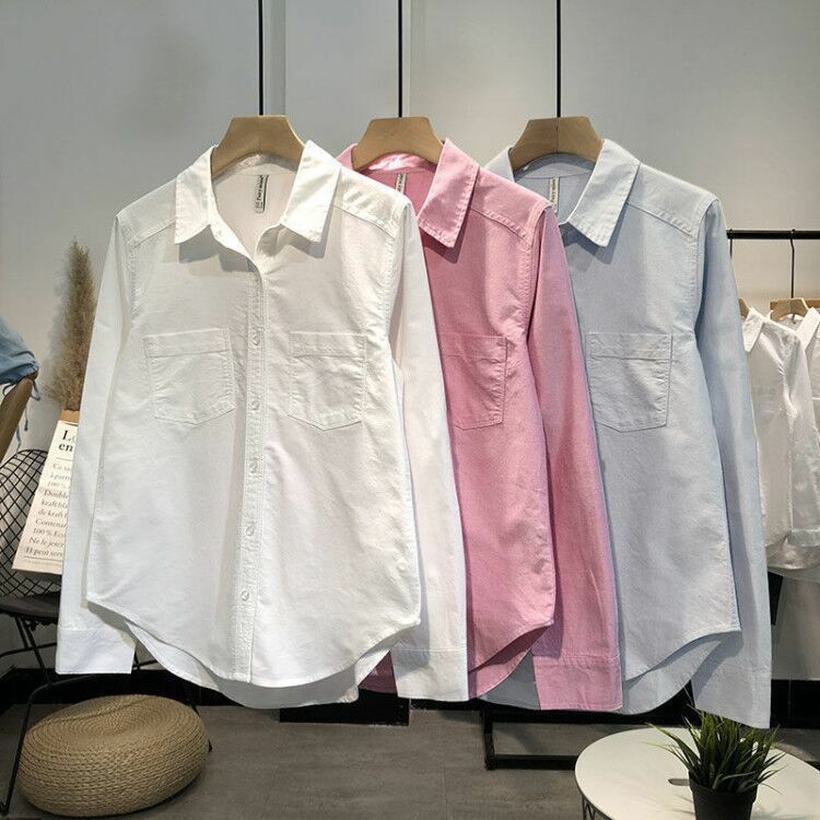 قمصان النساء 2021 ملابس علوية بأكمام طويلة للربيع بلوزة زرقاء ملابس علوية من القطن الإناث الكورية نمط موجز بدوره أسفل طوق جيوب قمصان بيضاء