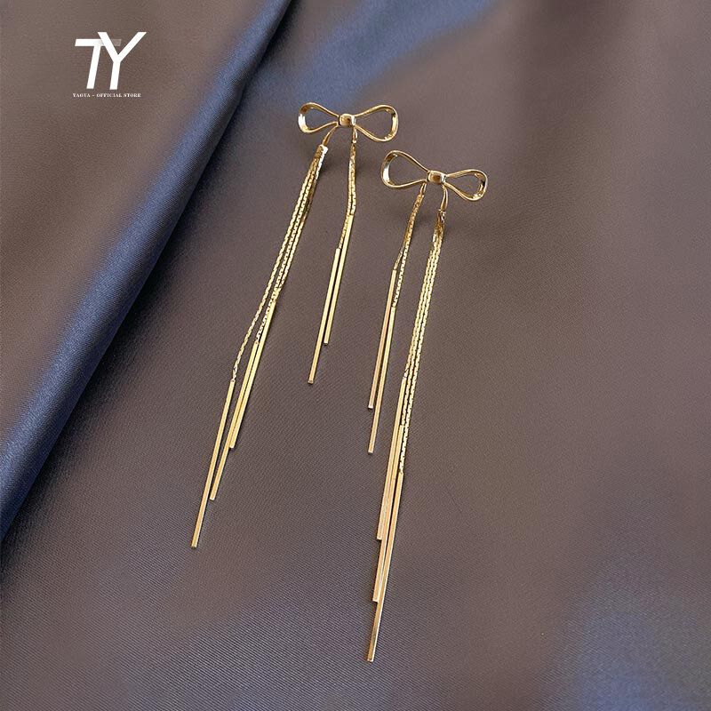 Klassische Metalls chleife Goldfarbe Quaste Tropfen Ohrringe für Frau neue koreanische Modeschmuck Hochzeits feier Mädchen sexy Ohrringe