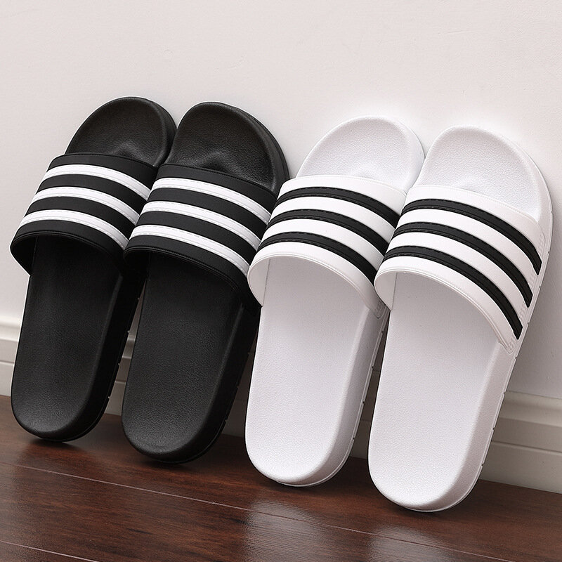 Chaussons pour hommes 2020 femmes hommes diapositives Couple tongs doux noir et blanc rayures décontracté Chaussures d'été mâle Chaussures Femme