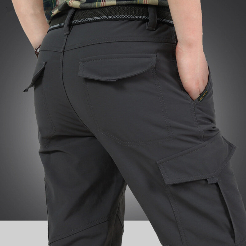 Calças de carga impermeáveis masculinas, calças longas táticas de velo grosso, calças causais elásticas, concha térmica quente para o inverno
