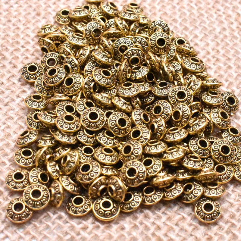 Yanqi 50 pçs tibetano antigo metal ouro cor oval ufo contas solto espaçador contas para fazer jóias diy encantos pulseira