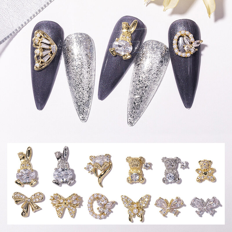 Decoración de uñas de lujo de aleación de diamante de cristal de oso de mariposa de circón de calidad, decoración de uñas de oro, cadena de moda, joyería de borla, 2 piezas