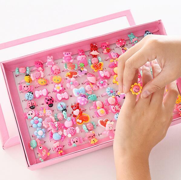 Lote de anillos de dibujos animados para niños, conjunto de anillos con forma de lazo, flor de caramelo, joyería de dedo mixta, juguetes para niñas, 10 unidades
