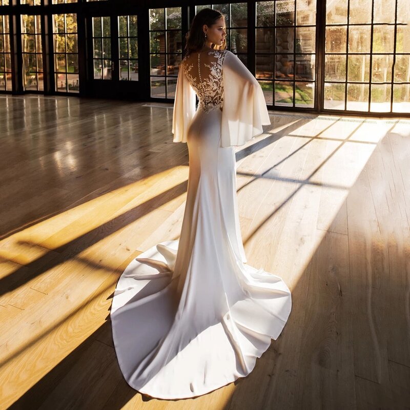Gaun pernikahan putri duyung 2024 gaun pengantin berkancing applique renda leher-o tipis Lengan Flare panjang gaun pengantin Sweep Vestidos De Novia