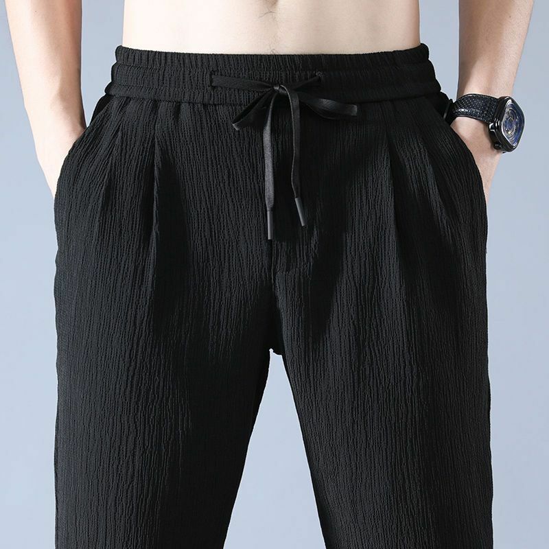 Letnie lodowy jedwab spodnie męskie lniane spodnie dresowe na co dzień męskie szybkoschnący sportowy spodnie haremowe do kostek 2023 moda uliczna