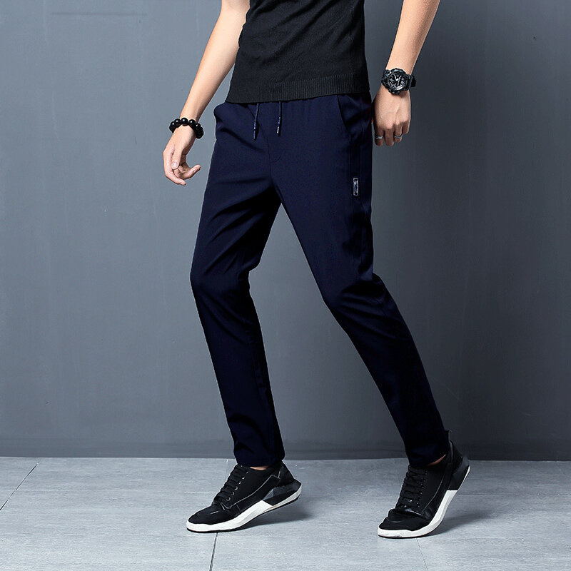 2024 nowe męskie koreańskie modne w stylu Casual, letnia cienkie szybkoschnące lodowy jedwab proste spodnie luźne sportowe 9-punktowe spodnie chłopiec