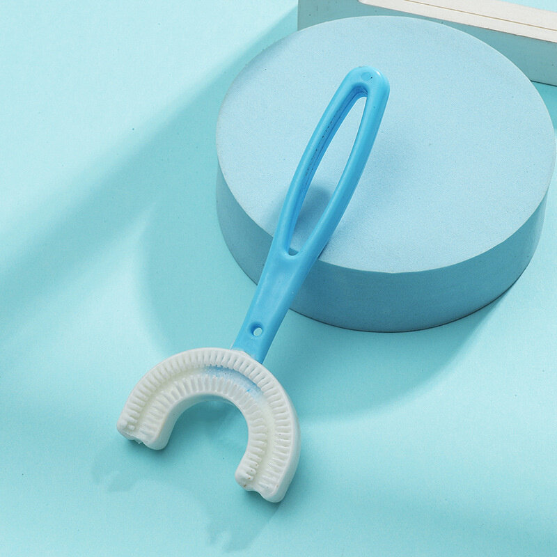 2024 spazzolino da denti per bambini alla moda spazzolino da denti per neonati a forma di U con manico spazzola per la pulizia orale in Silicone per bambini dai 2 ai 12 anni
