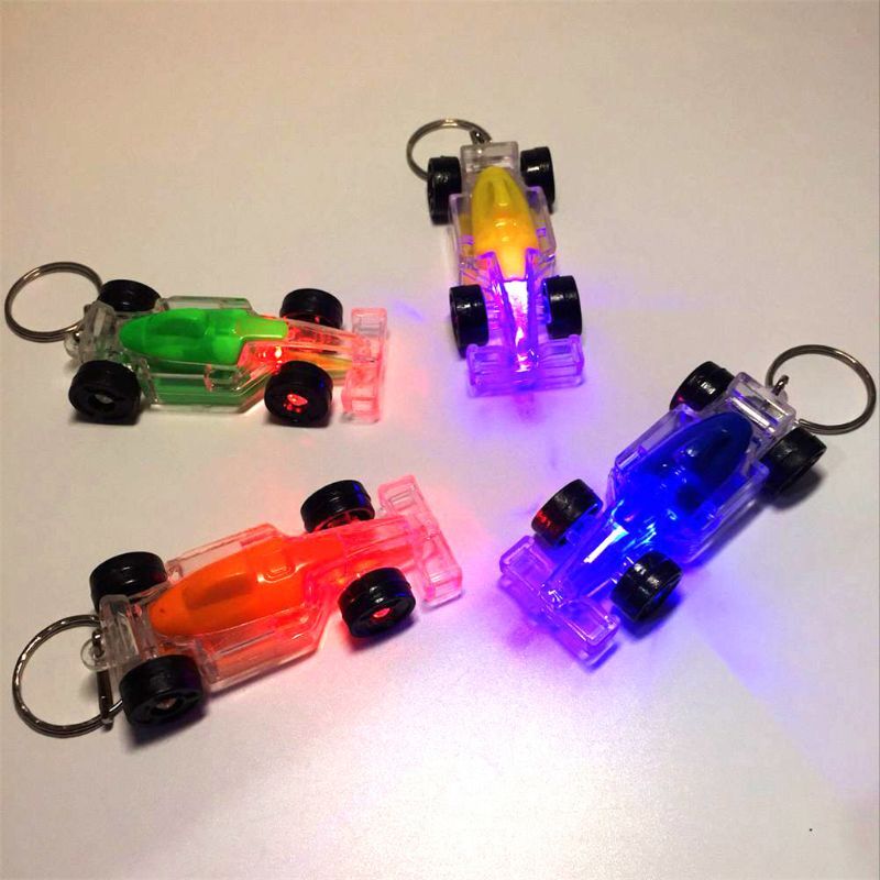 Mini Racing LED Light-Up ของเล่น Keychain Party Favors เด็กของเล่นของขวัญ Gadgets กระเป๋าจี้