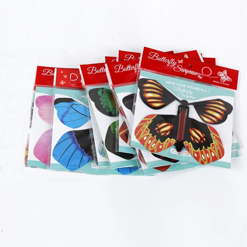 10 PC Pesta Magic Trick Toy Peri Terbang Di Pesan Butterfly Gelang Karet Powered Angin Kupu-kupu Mainan Kejutan hadiah untuk Anak-anak