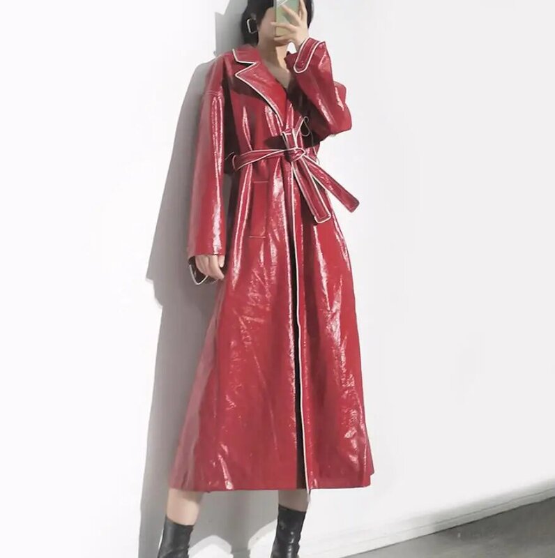 High Quality PU leather Glossy Windbreaker Women Autumn Street Fashion Long Sleeve Slim Belt Leather Coat veste femme s1388