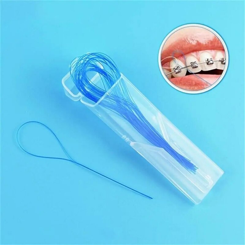 Ортодонтический инструмент для имплантации зубной нити