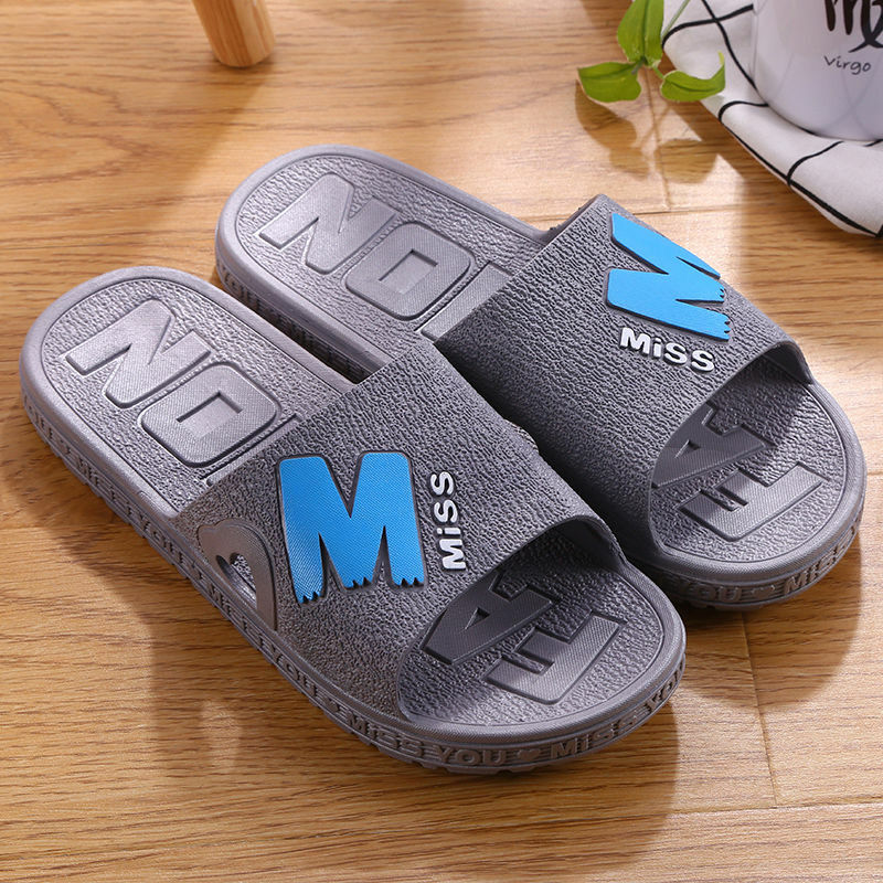 Unique massage slippers anti-slip fashion wear a word cool drag beach trend Korean version of the family indoor men's sandals