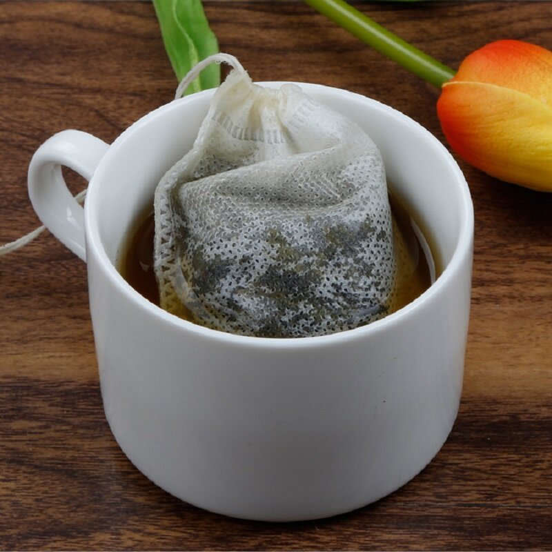 50/100 Pcs/Lot sachets de thé 5x7 CM vides parfumés avec chaîne guérir joint papier filtre pour herbe thé en vrac Bolsas de te
