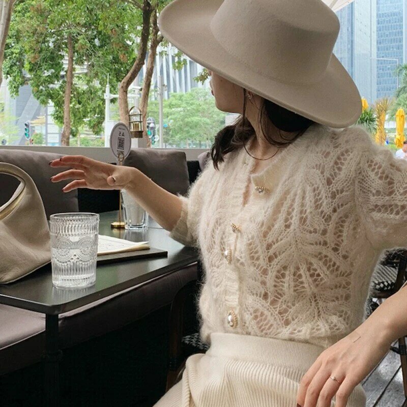 2022 new sweater autumn white openwork knitted cardigan french mohair coat sweater female air-conditioning suit 16179
