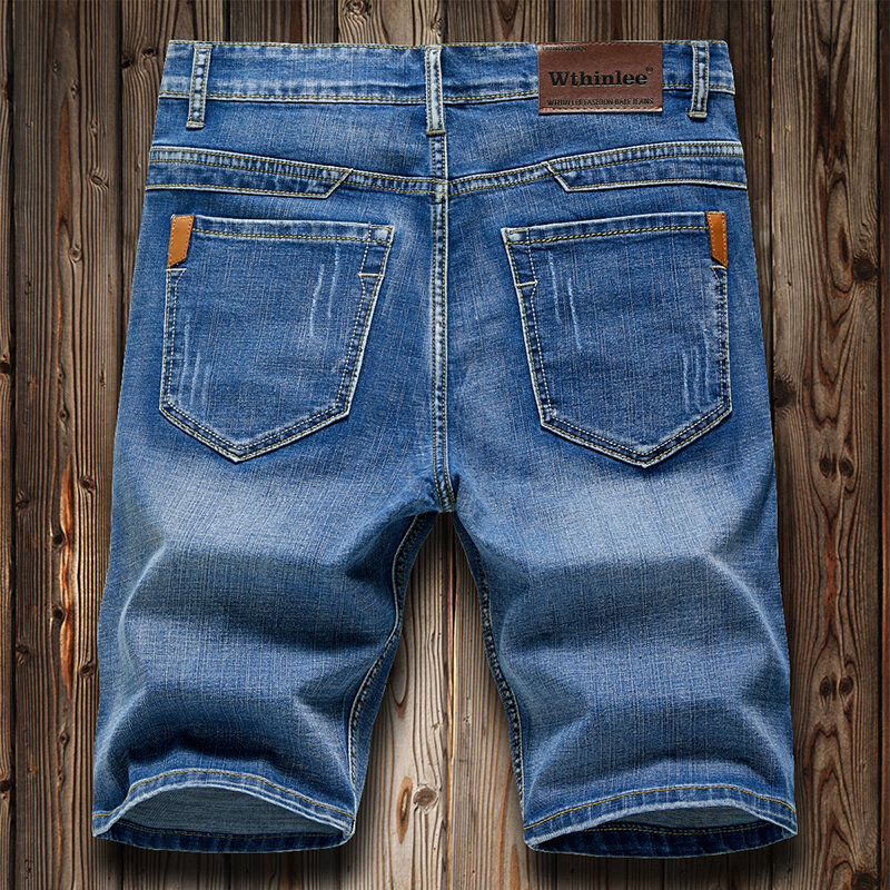 Pantalones cortos vaqueros ajustados para hombre, Jeans elásticos holgados que combinan con todo, pantalones de cinco puntos de marca de alta gama, moda informal de negocios, verano 2023