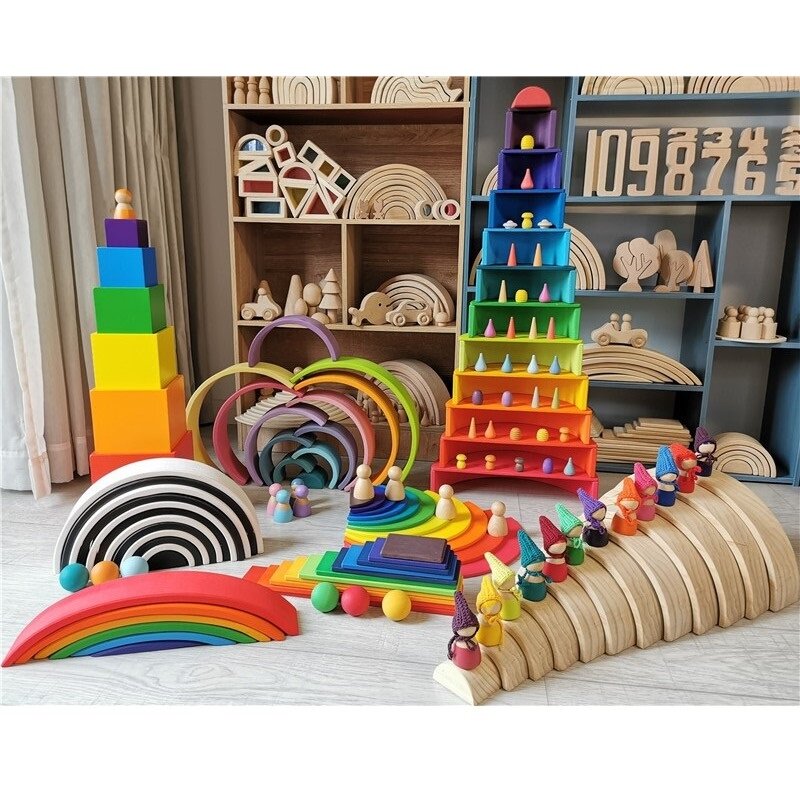 木製の虹色のアーチ型のビルディングブロック,パステル,半円形のボール,スタッキングのおもちゃ