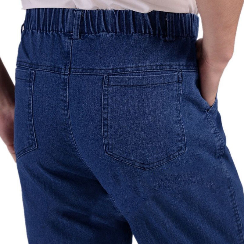 Durevole abbigliamento da lavoro all'aperto Jeans dritti pantaloni uomo elastico in vita Casual gamba larga pantaloni in Denim di cotone spesso classico papà sciolto