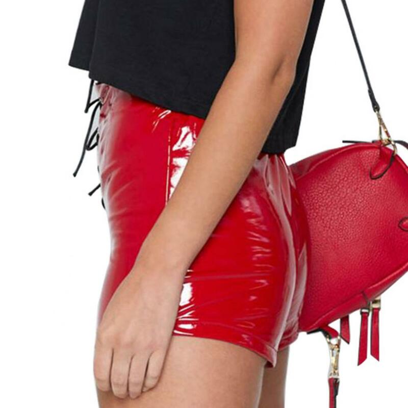 セクシーな女性ソリッドカラー絶妙なアイレットクロス包帯ハイウエストスリム摩耗耐性のショートパンツ夏2021