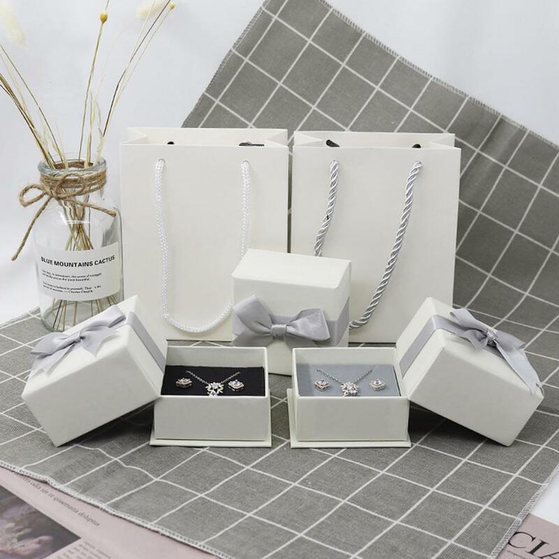 Kotak Penyimpanan Perhiasan Anting Kalung Cincin Desain Busur Warna Solid Persegi Nyaman Bergaya Multifungsi Casing