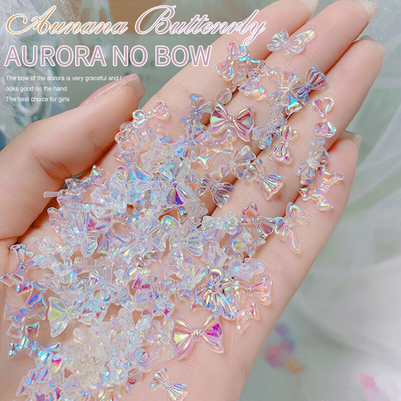 100 buah campuran seni kuku busur 3D seni kuku dekorasi Glitter kupu-kupu Aurora warna AB kristal DIY kuku berlian imitasi aksesori