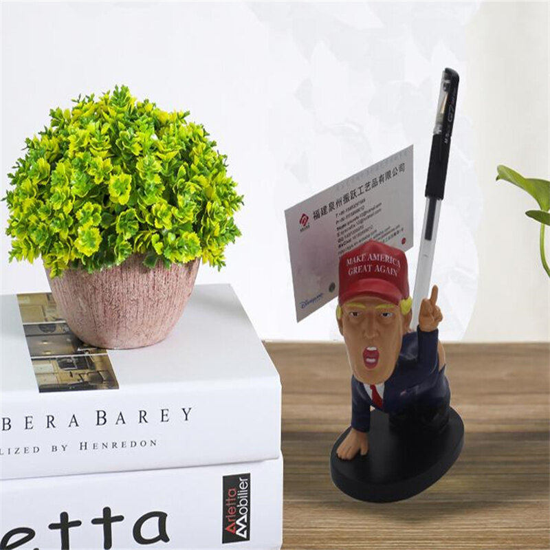 ¡Nuevo! Soporte creativo para bolígrafo Trump modelo de escritorio adornos de personajes de dibujos animados de moda