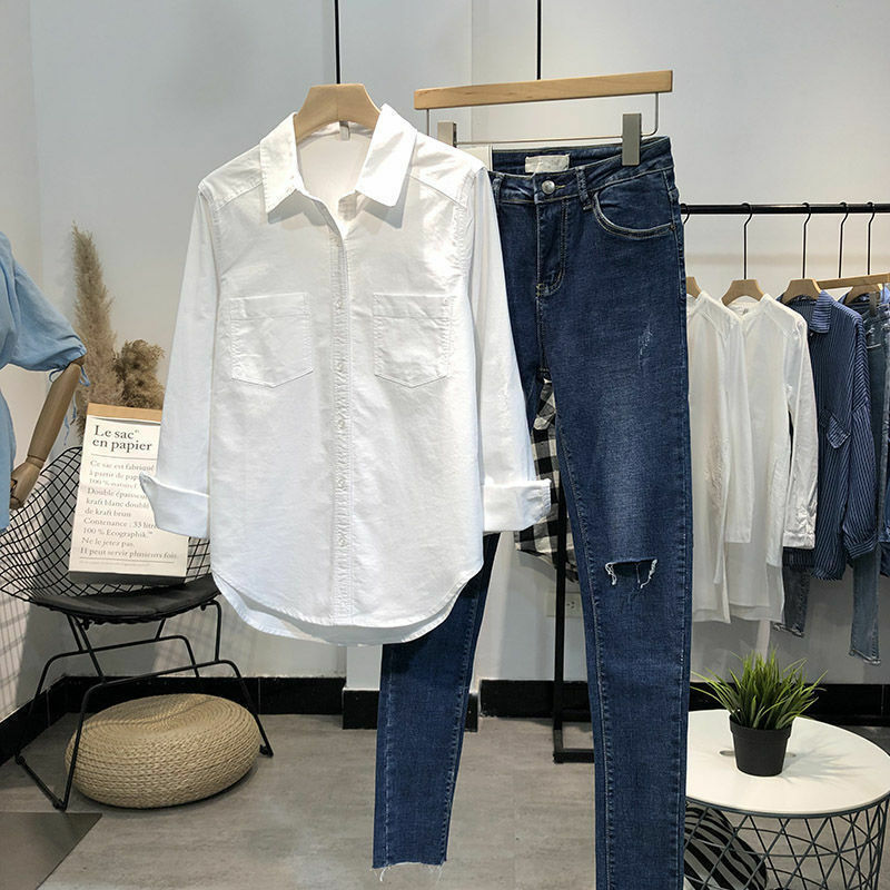 قمصان النساء 2021 ملابس علوية بأكمام طويلة للربيع بلوزة زرقاء ملابس علوية من القطن الإناث الكورية نمط موجز بدوره أسفل طوق جيوب قمصان بيضاء