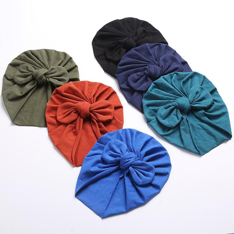 Berretti di cotone per bambini solidi cappelli di turbante Bowknot con orecchio di orso carino dolce morbido 0-4T cappellini elastici per neonato
